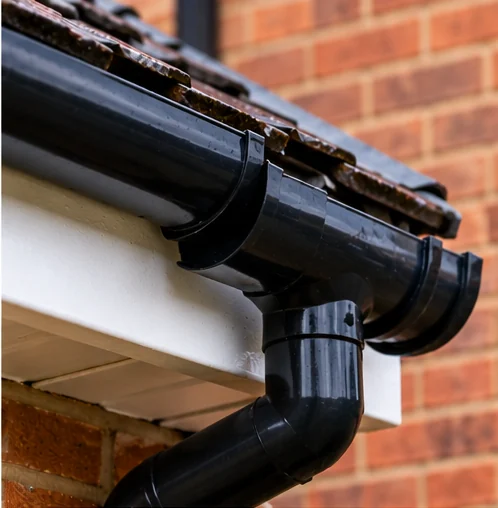 Damaged rainwater guttering requiring replacement brackets and fittings